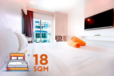 デラックス・ダブルまたはツインルーム（バルコニー付） — Mirage Express Patong Phuket Hotel